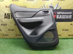 Обшивка двери задняя левая Mitsubishi L200 SUV