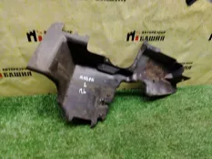 Дефлектор радиатора левый Nissan Navara D40M