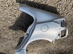 Крыло Mitsubishi Lancer