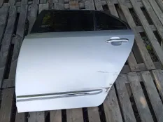 Дверь Kia Carens
