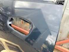 Дверь Mazda 323