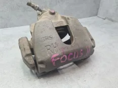 Суппорт тормозной Ford Focus