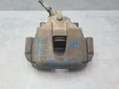 Суппорт тормозной Ford Focus