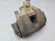 Суппорт тормозной Ford Focus