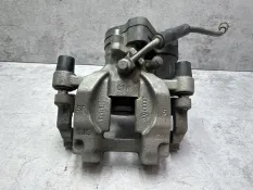 Суппорт тормозной Volkswagen Passat