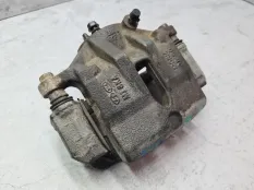 Суппорт тормозной Kia Sportage