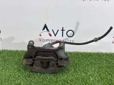 Суппорт тормозной Volkswagen Tiguan