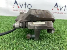 Суппорт тормозной Volkswagen Golf