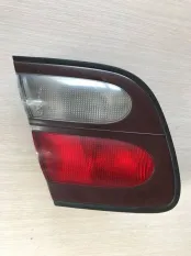 Фонарь внутренний задний левый Nissan Almera 1