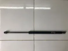 Амортизатор крышки багажника Mazda Tribute CU09B