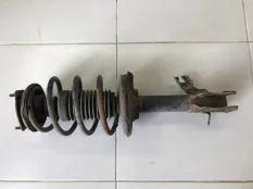 Амортизатор (В сборе) передний левый Nissan Almera