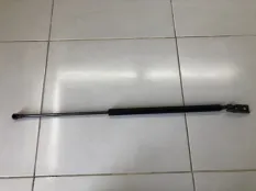 Амортизатор крышки багажника левый Mazda 323 BJ