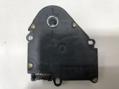 Моторчик заслонки отопителя Cadillac Escalade