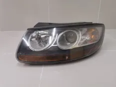 Фара левая Hyundai Santa Fe 2 CM