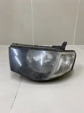 Фара левая Mitsubishi L200 KB