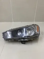 Фара левая Mitsubishi Lancer 10 CX
