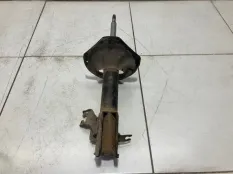 Амортизатор передний левый Nissan Almera Classic