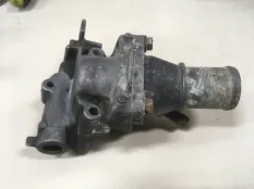 Корпус термостата Renault Logan 1