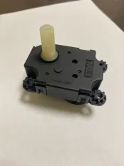 Моторчик заслонки отопителя Mitsubishi Lancer 10