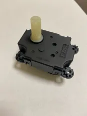 Моторчик заслонки отопителя Mitsubishi Lancer 10