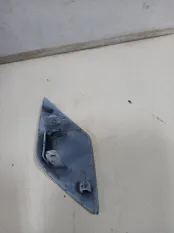 Крышка форсунки омывателя фары передняя правая