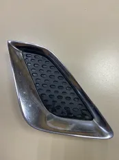 Накладка бампера передняя левая Mitsubishi
