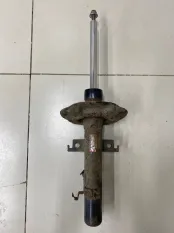 Амортизатор передний левый Nissan X-Trail T32