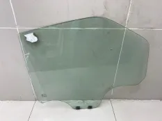 Стекло двери заднее левое Renault Logan 1 K7M710