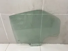 Стекло двери заднее левое Renault Logan 1