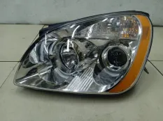 Фара левая Kia Carens 2 FG