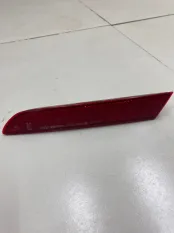 Отражатель в бампер задний правый Mazda CX-7