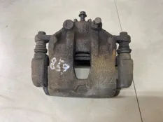 Суппорт тормозной передний левый Kia Rio 3 QB