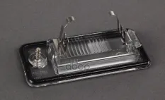 Фонарь освещения номерн. знака AUDI A3 2003-2012 VAG 8E0943021B (8E0943021B) VAG арт. 8e0943021b