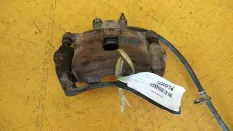 Суппорт передний Mitsubishi L200 KB 2010