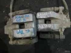 Суппорт задний Toyota Camry