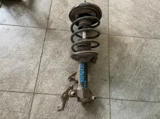 Амортизатор передний Nissan Primera