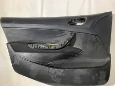 Обшивка двери передняя левая Peugeot 308