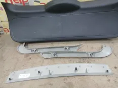 Обшивка багажника Ford Focus 2009 1701355 CB4 HXDA; HXDB; SIDA, задняя