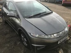 Суппорт Honda Civic 2007 45019SMGE01 5D R18A2, передний левый