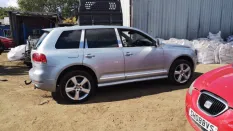 Фара Volkswagen Touareg 2005 7L6941017BG 7L7 AYH, левая