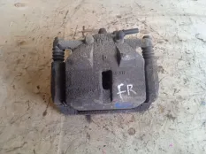 Суппорт Nissan Qashqai 2011 41011JD00A J10 K9K, передний левый