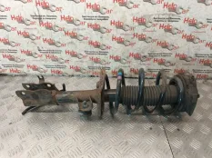 Стойка подвески Nissan Qashqai 2009 54303JD04A J10 K9K, передняя левая