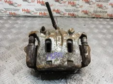 Суппорт Nissan Navara 2007 41011EB32A D40 YD25DDTI, передний левый