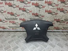 Подушка безопасности водителя Mitsubishi Pajero 2006 7030A805XA V98W 4M41