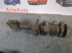 Амортизатор подвески передний левый Subaru Outback