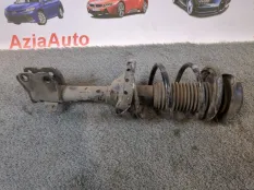 Амортизатор подвески передний левый Subaru Outback