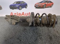 Амортизатор подвески передний левый Subaru