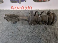 Амортизатор подвески передний левый Subaru
