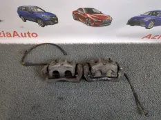Суппорт тормозной передний Toyota Camry XV70