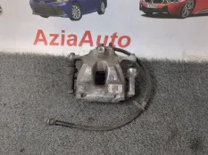 Суппорт тормозной передний левый Toyota Corolla